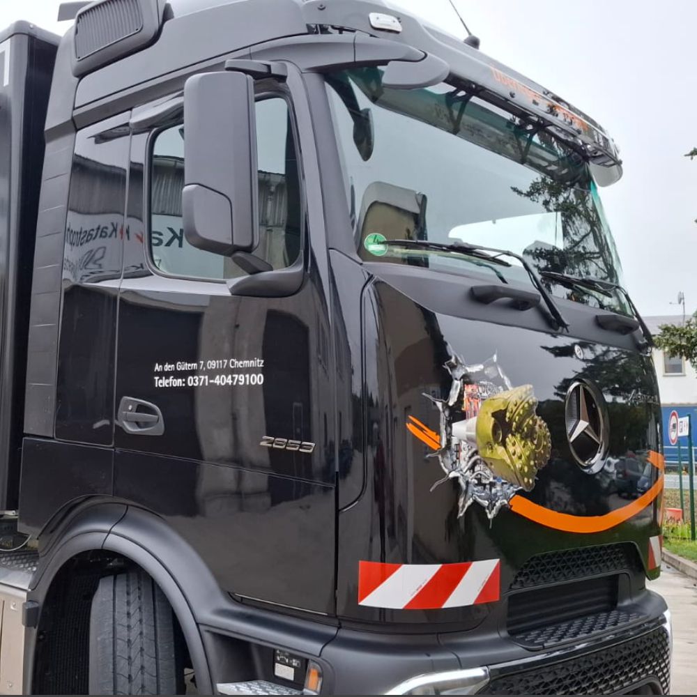 Lkw-Beklebung